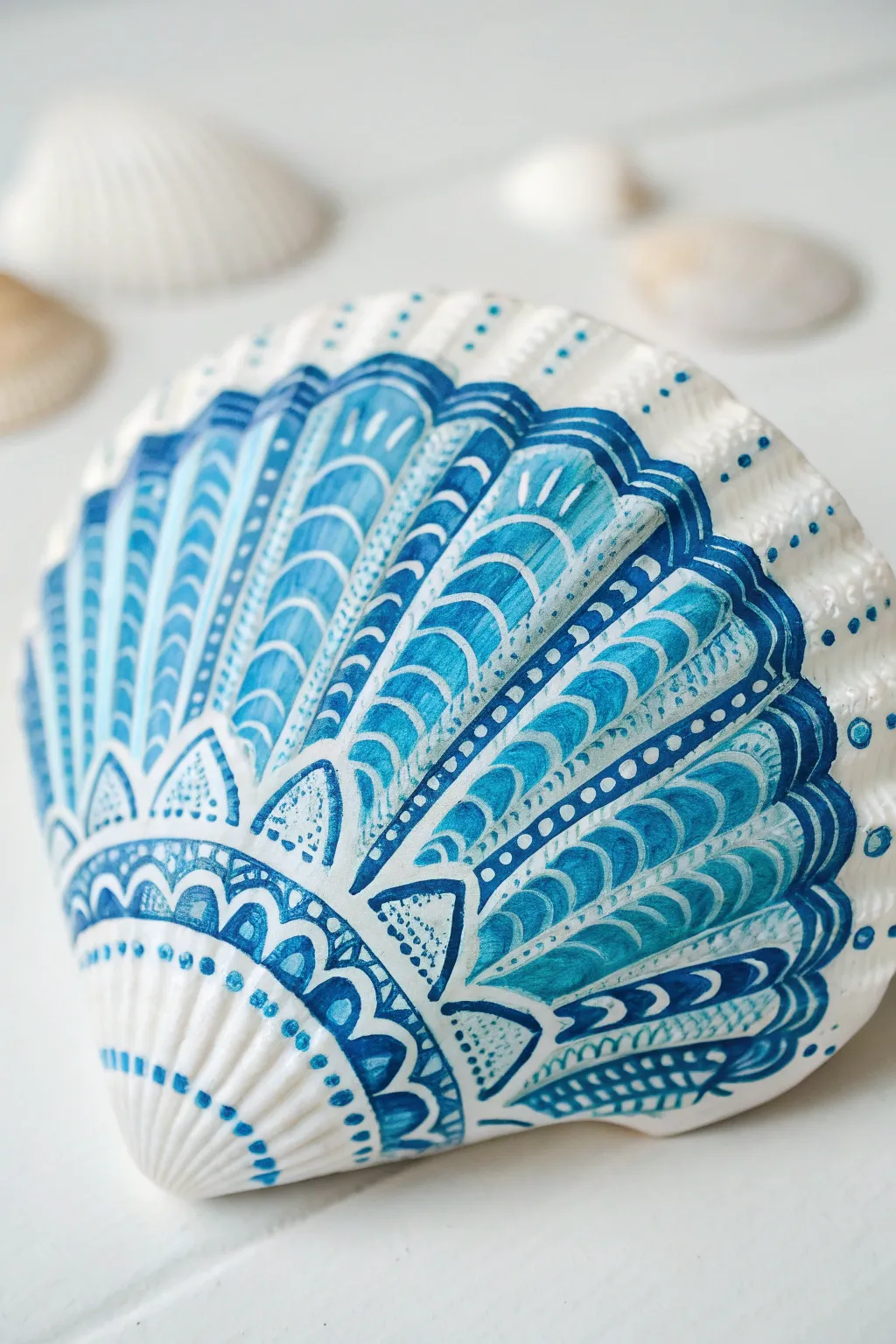 Dive into tranquility with monochromatic shell art in soothing blues.