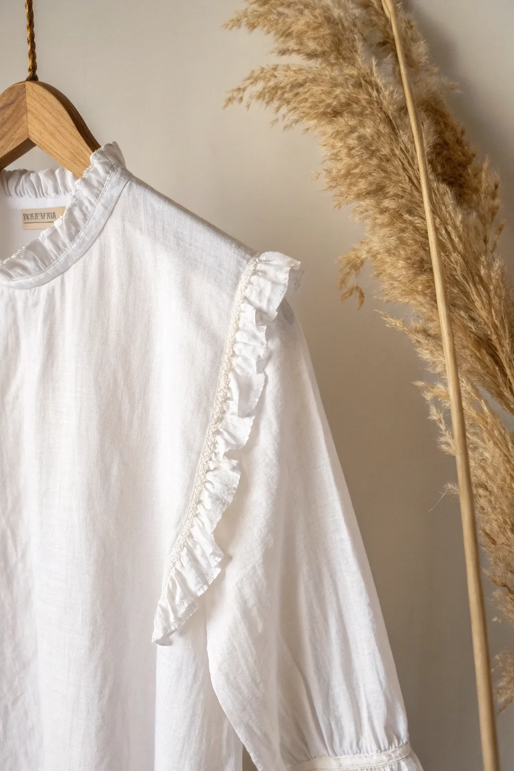 Embrace effortless elegance with handcrafted ruffles for a touch of romantic flair.