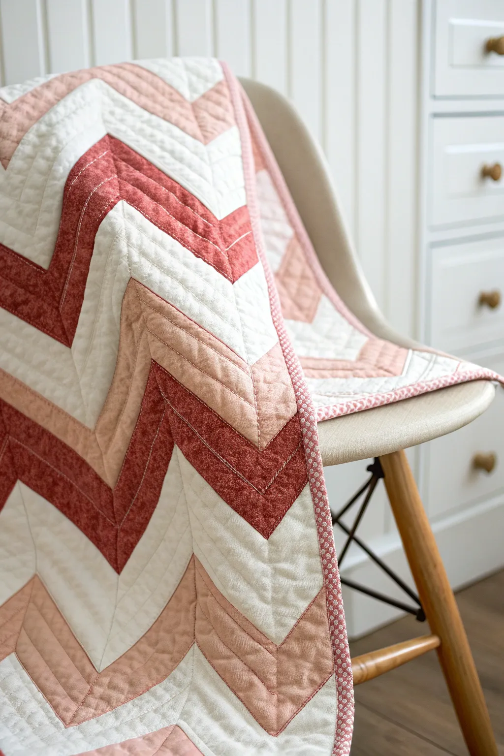Embrace simplicity with a textured chevron quilt, where craftsmanship meets minimalist elegance.