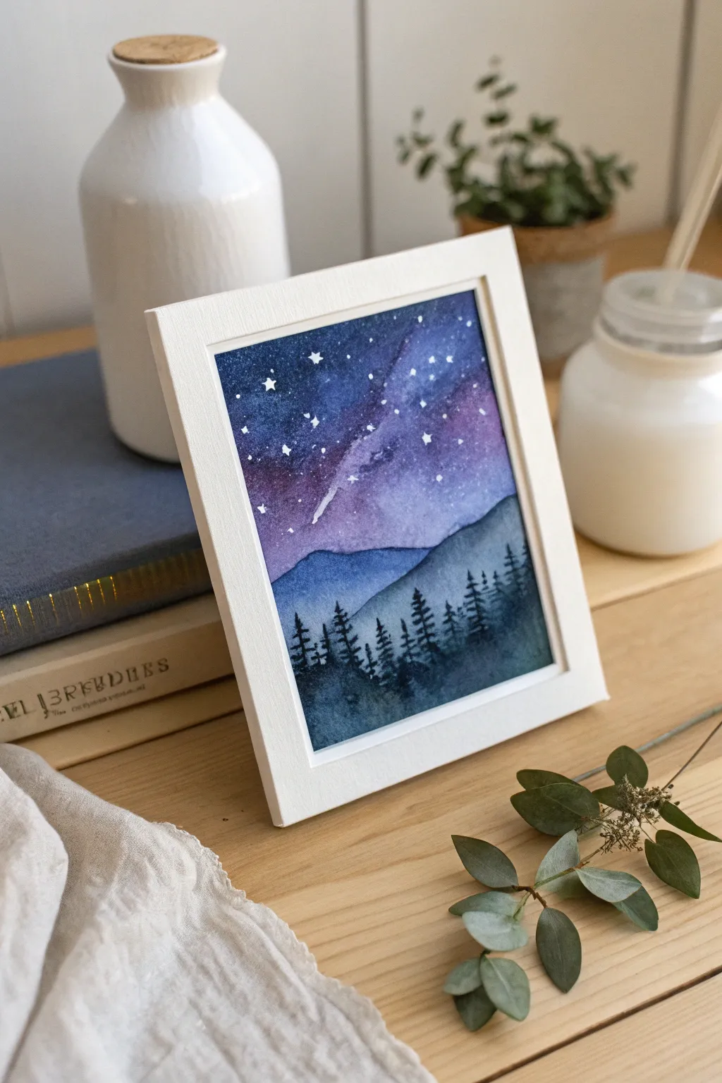Capture the magic of the cosmos with a handcrafted touch in this serene night sky watercolor.