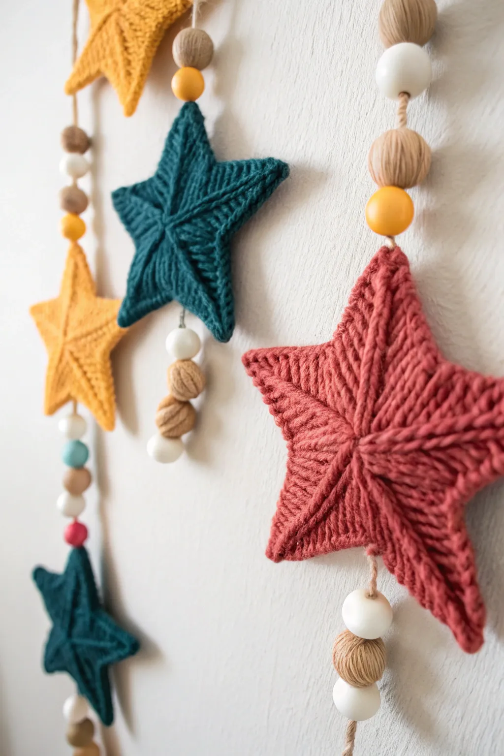 Bring warmth and charm to your space with this handcrafted yarn star garland. Perfect for rainy day crafts!