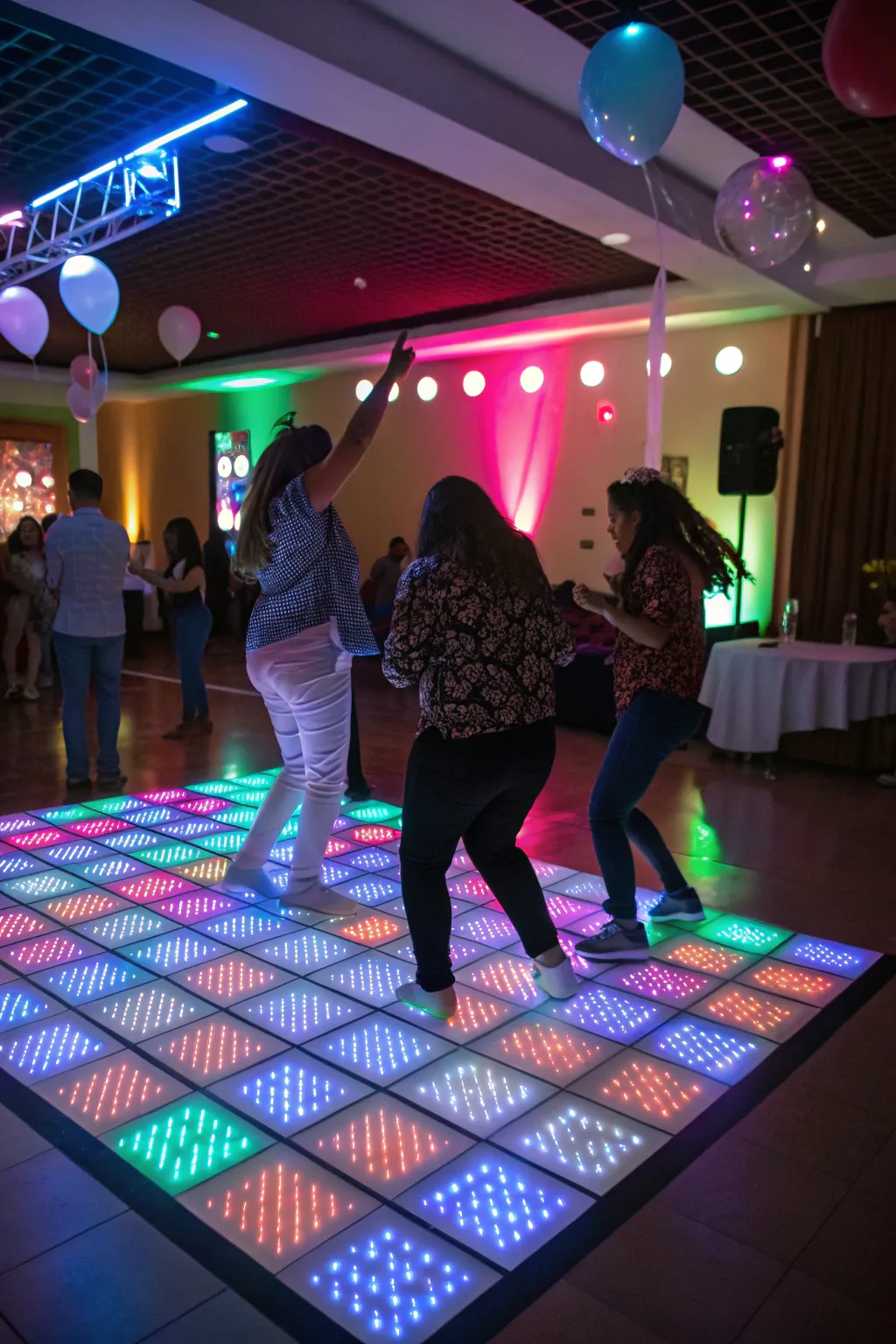 An interactive LED dance floor keeps the energy high and guests dancing throughout the night.