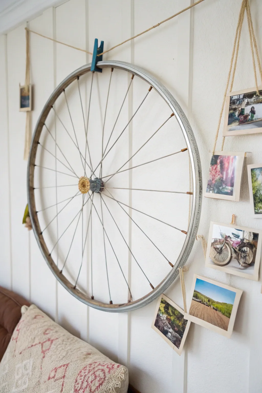 Transform memories into art with this minimalist and boho-inspired bicycle wheel photo display.