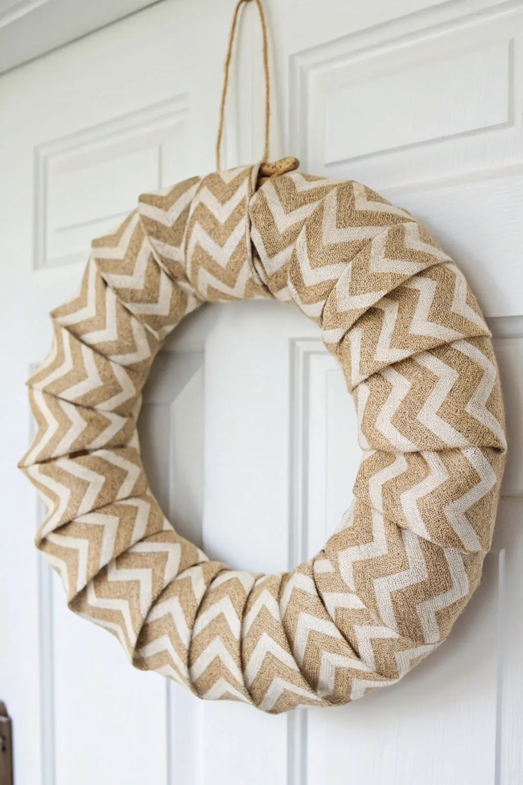 Elevate your decor with a chic chevron burlap wreath—where trendy meets timeless.