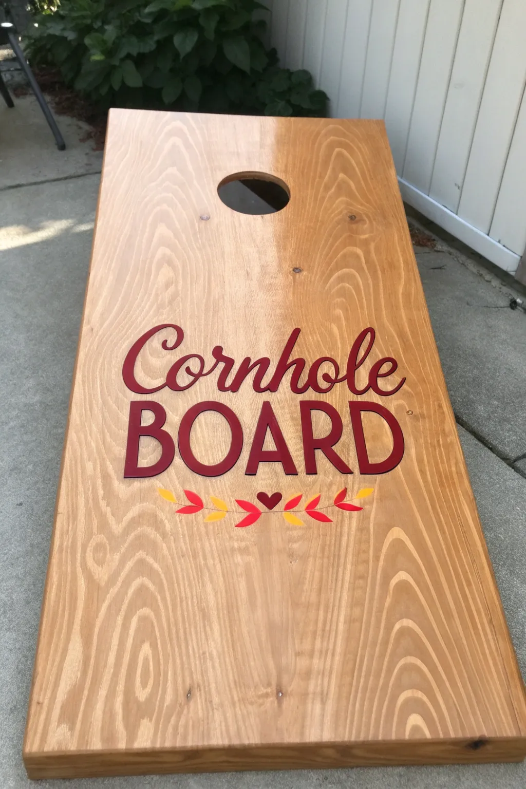 Add laughter to your game with a witty cornhole board that boasts both style and humor.