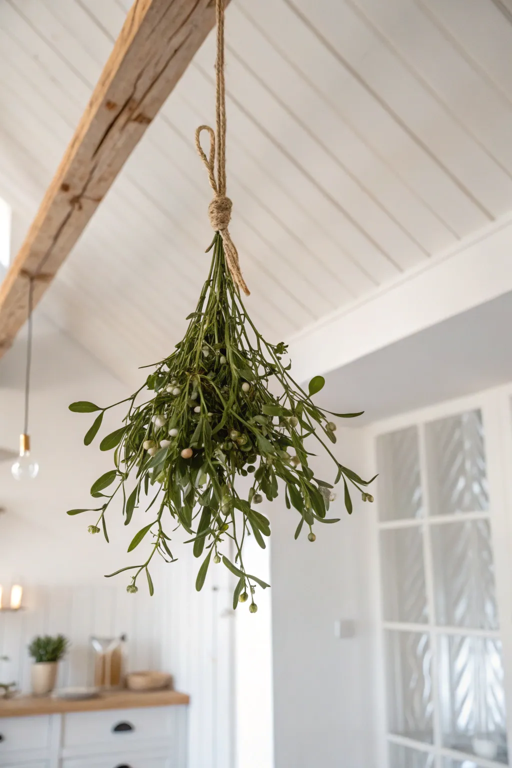 Embrace the charm of simplicity with a touch of festive romance. 🌿✨ #CeilingMistletoe #ScandiBohoChristmas