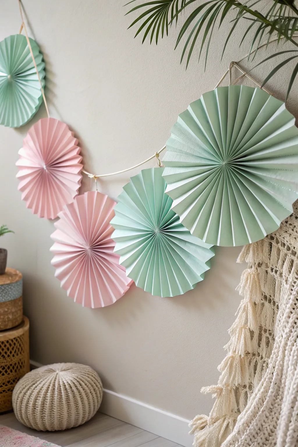 Elevate your space with a charming paper fan garland, blending Scandinavian simplicity with a hint of boho flair.