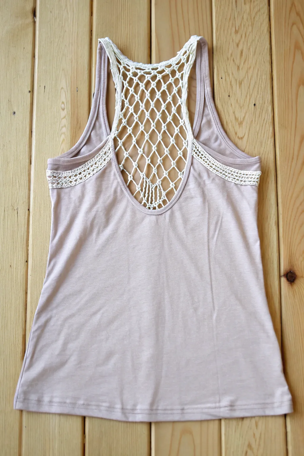 Transform your tank top with a chic mesh panel insert for an effortlessly stylish look!