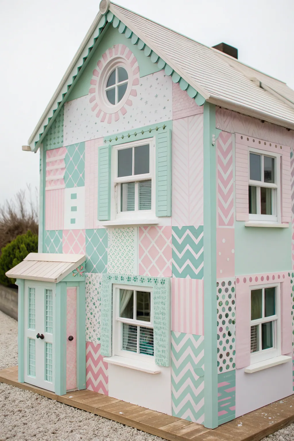 Embrace whimsy with a quirky patchwork dollhouse exterior that captures the essence of playful elegance and minimalist charm.