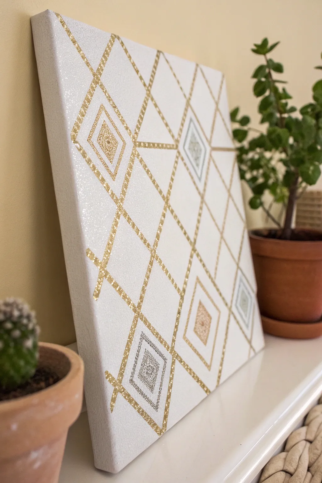 Elevate your space with the elegance of glitter stenciled art – where simplicity meets sparkle.