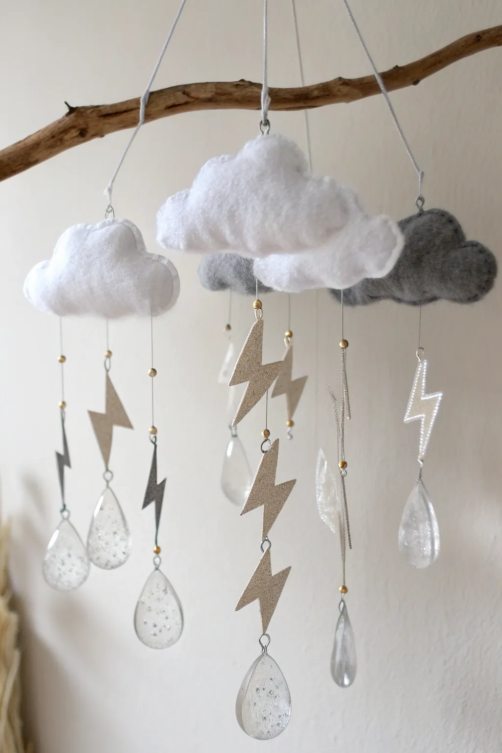 Bring the beauty of stormy skies indoors with this artisan-crafted mobile that dances with the breeze.