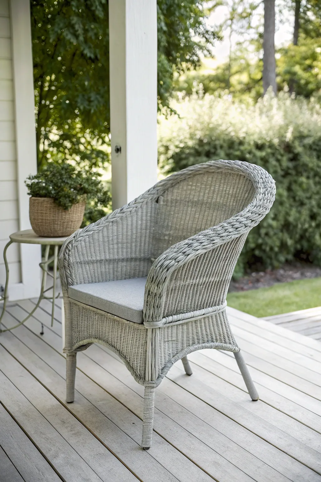 Transform your patio with monochrome magic—elevate your space with elegant, painted wicker furniture.
