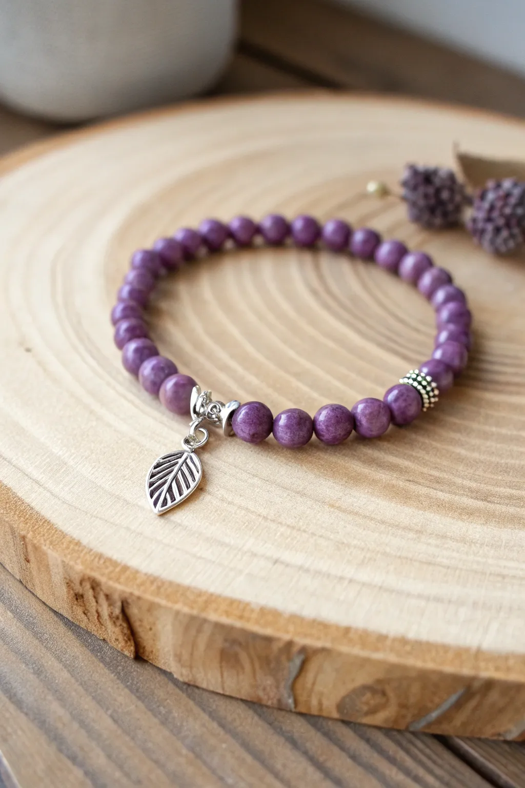 Embrace nature's elegance with this handcrafted purple clay bead bracelet, perfect for adding a touch of the outdoors to your minimalist style.