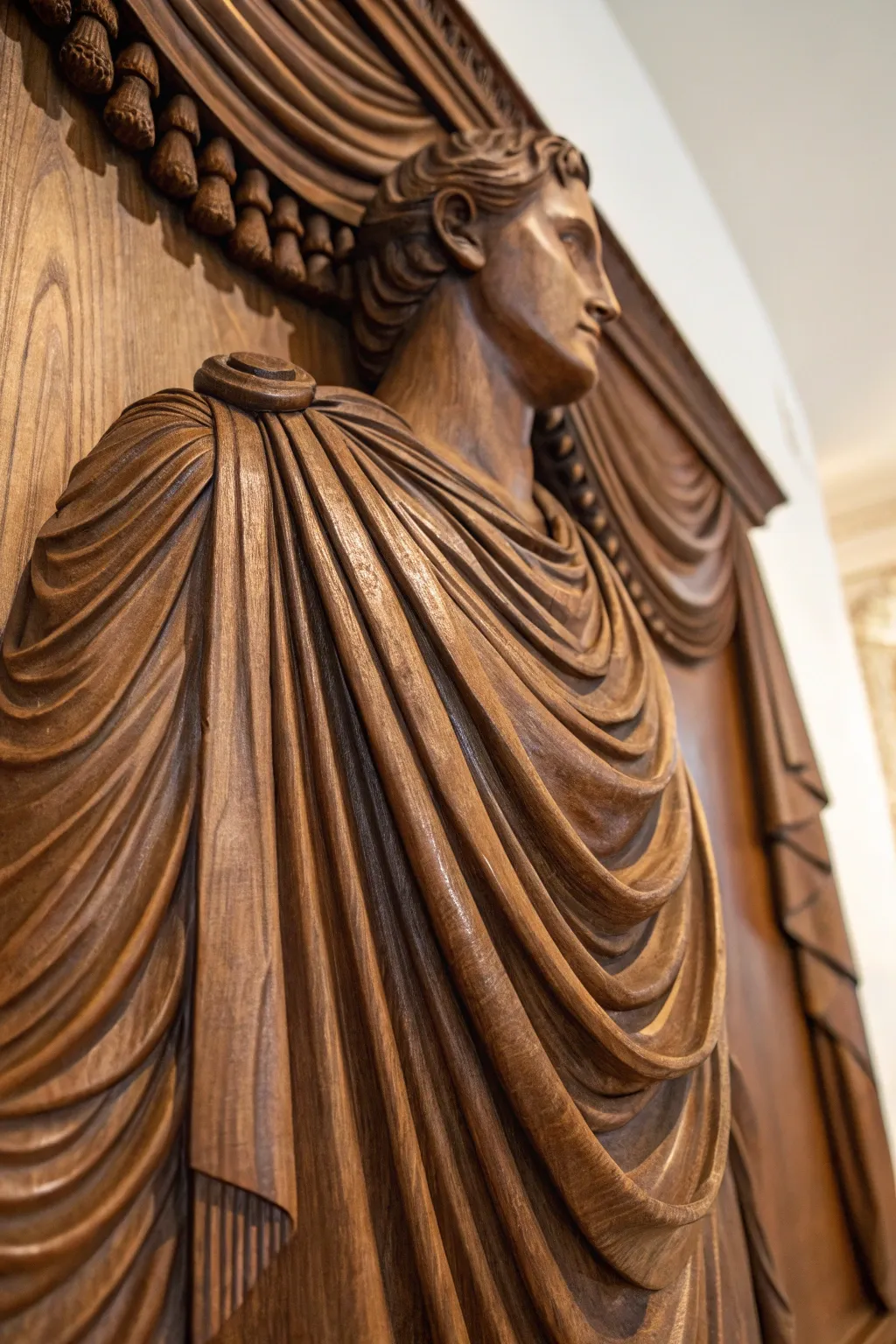 Discover the art of fabric fold in relief sculpture—where elegance meets craftsmanship.