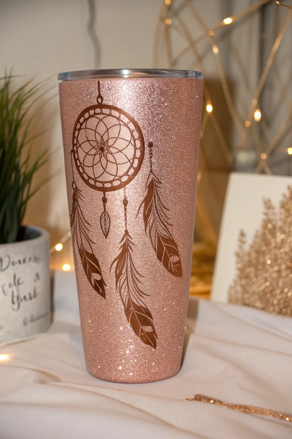Embrace your wanderlust with this boho-inspired rose gold glitter tumbler.