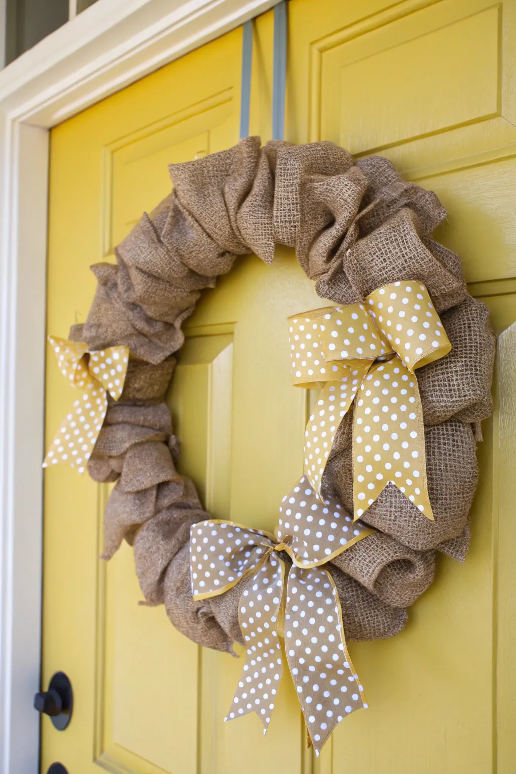 Polka dots add a playful touch to this spring burlap wreath.