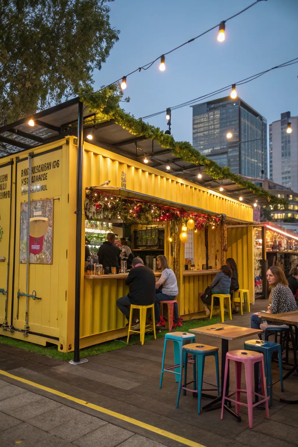A shipping container repurposed as a lively outdoor entertainment area.