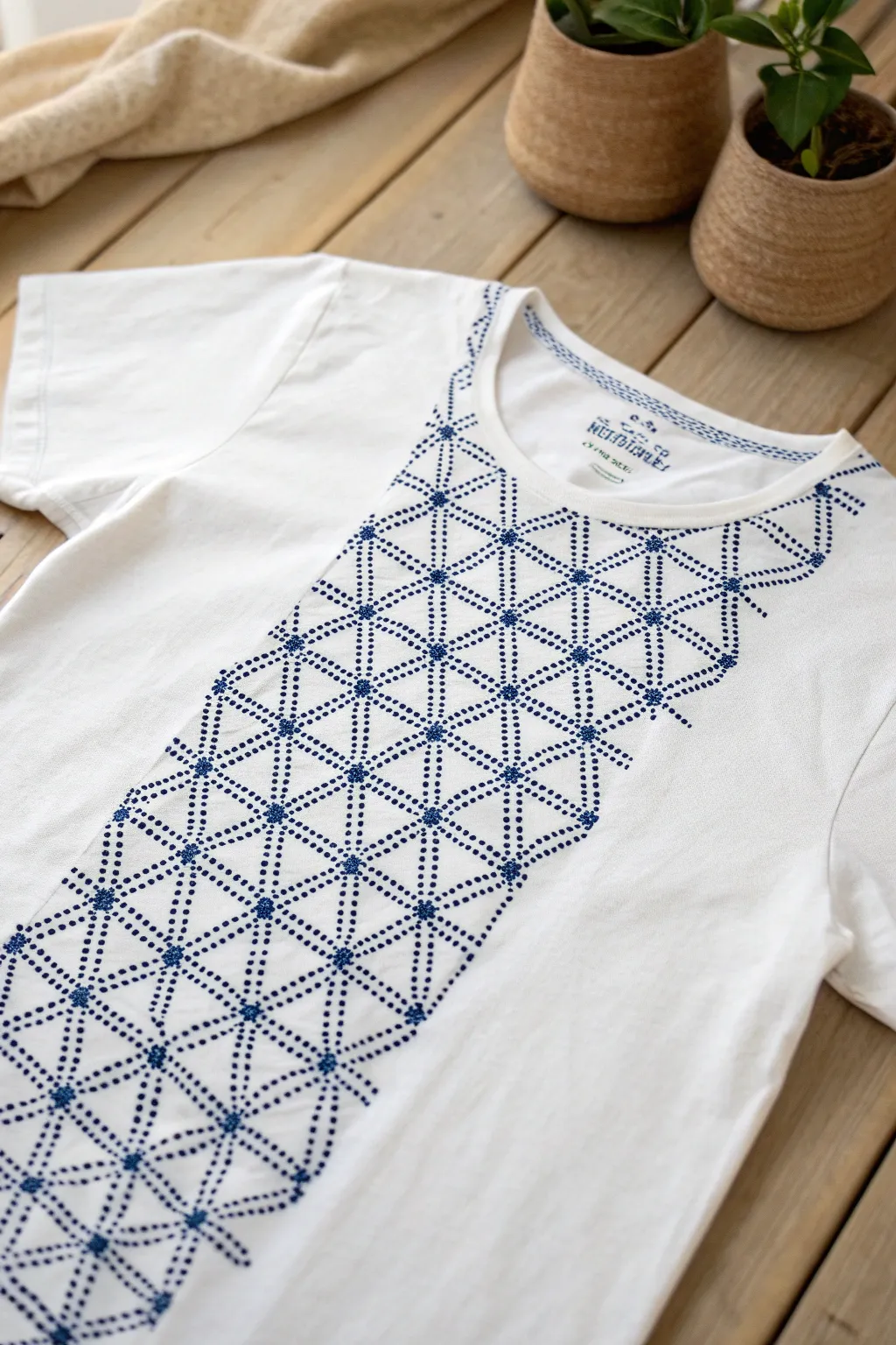 Elevate your t-shirt game with the art of Sashiko stitching, where minimalism meets elegance.