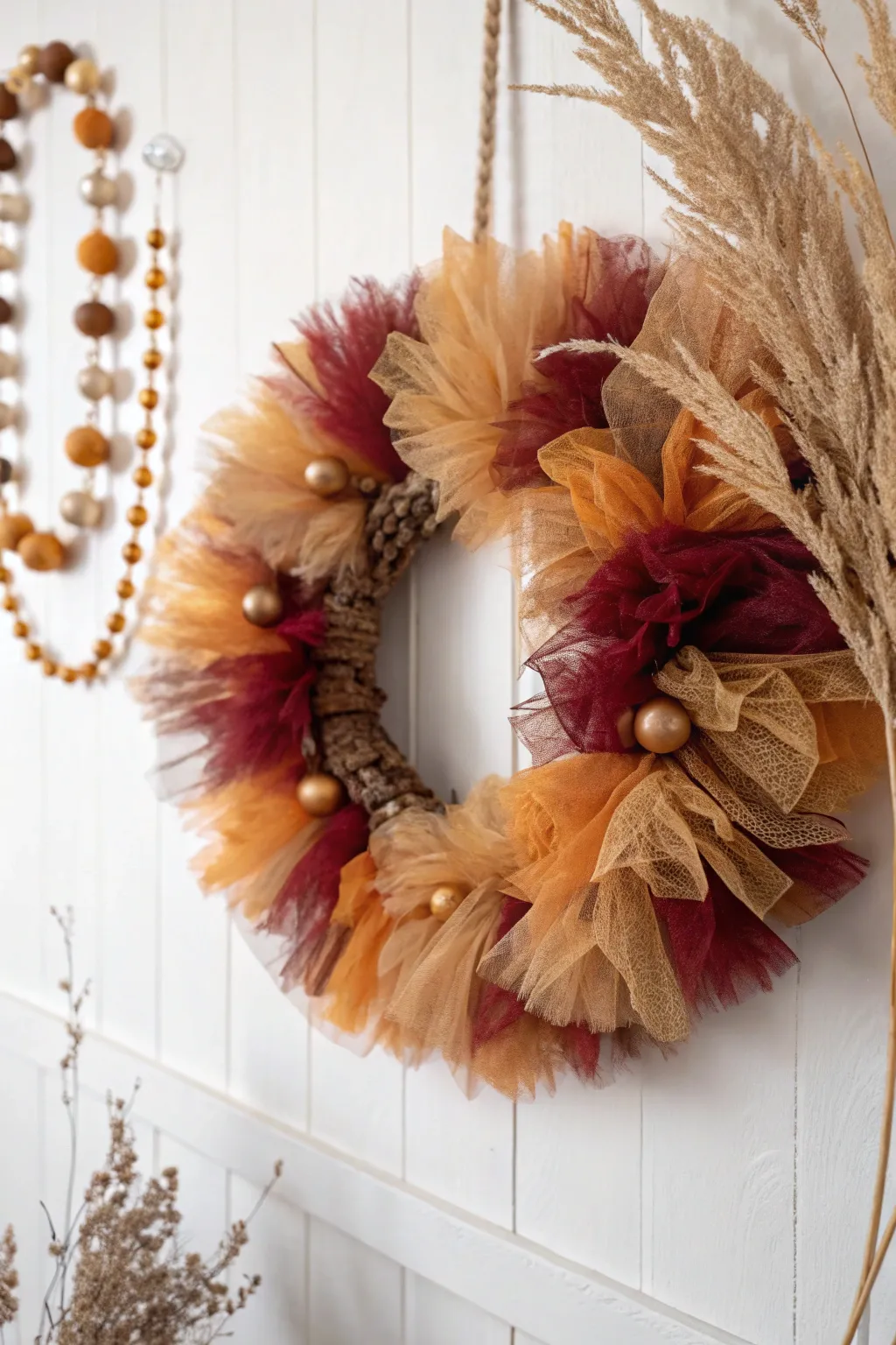 Add a whimsical touch to your Thanksgiving decor with this charming tulle wreath.