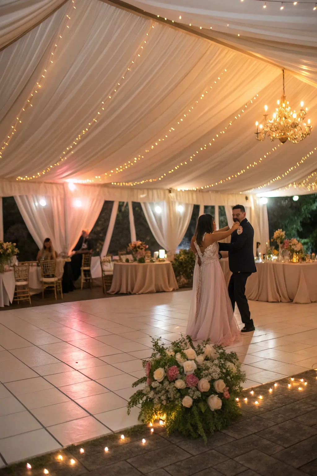 A tented dance floor invites guests to dance the night away.