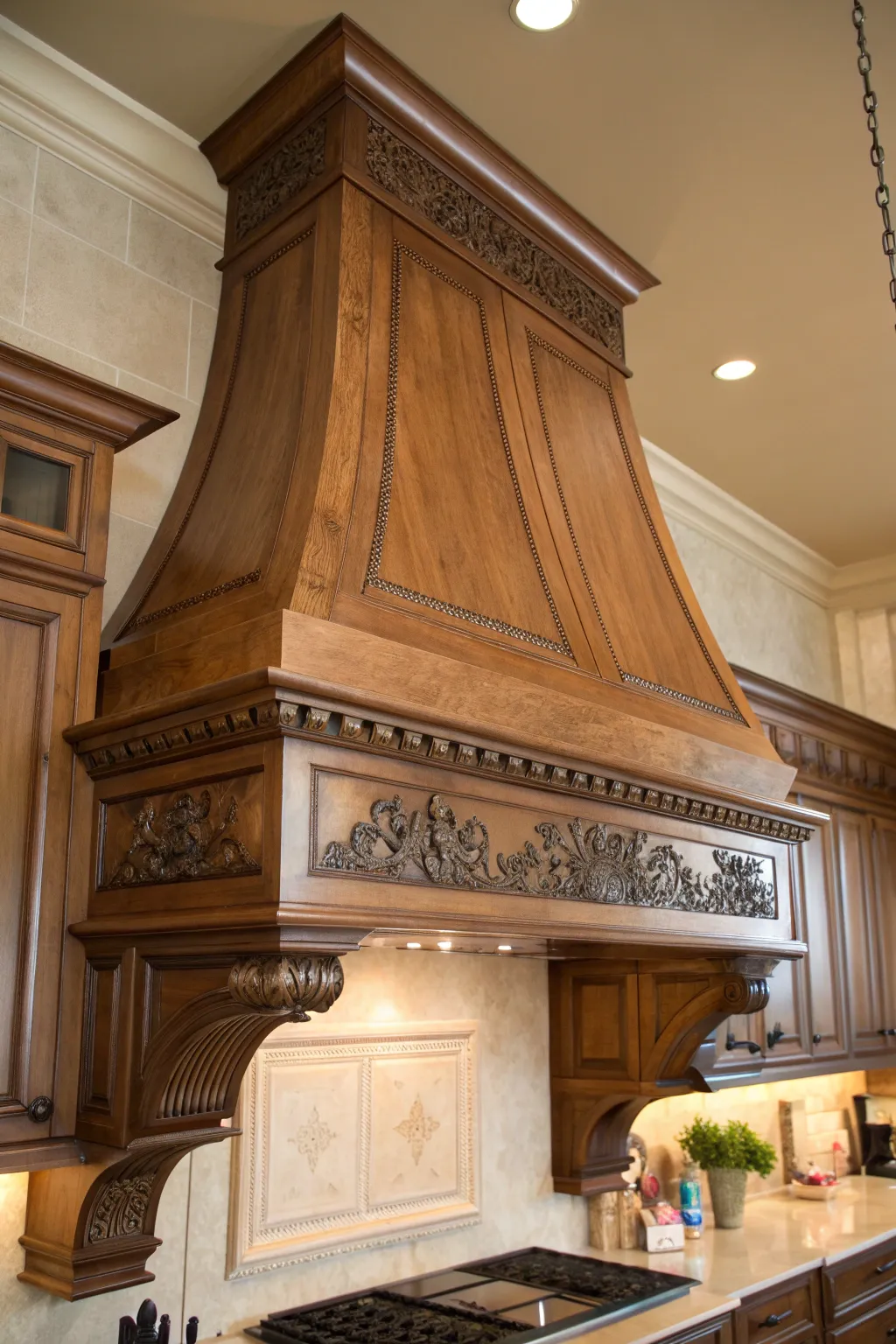 Experience the charm of traditional elegance with this handcrafted wooden range hood, a masterpiece of classic craftsmanship.