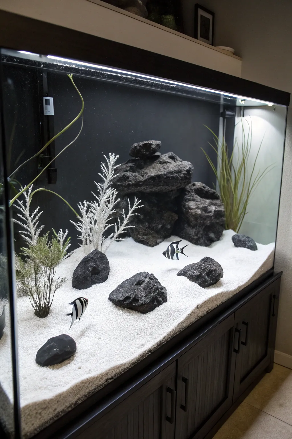 Dive into the elegance of monochrome magic with this stunning tank setup. #Craftsmanship #ModernAquarium
