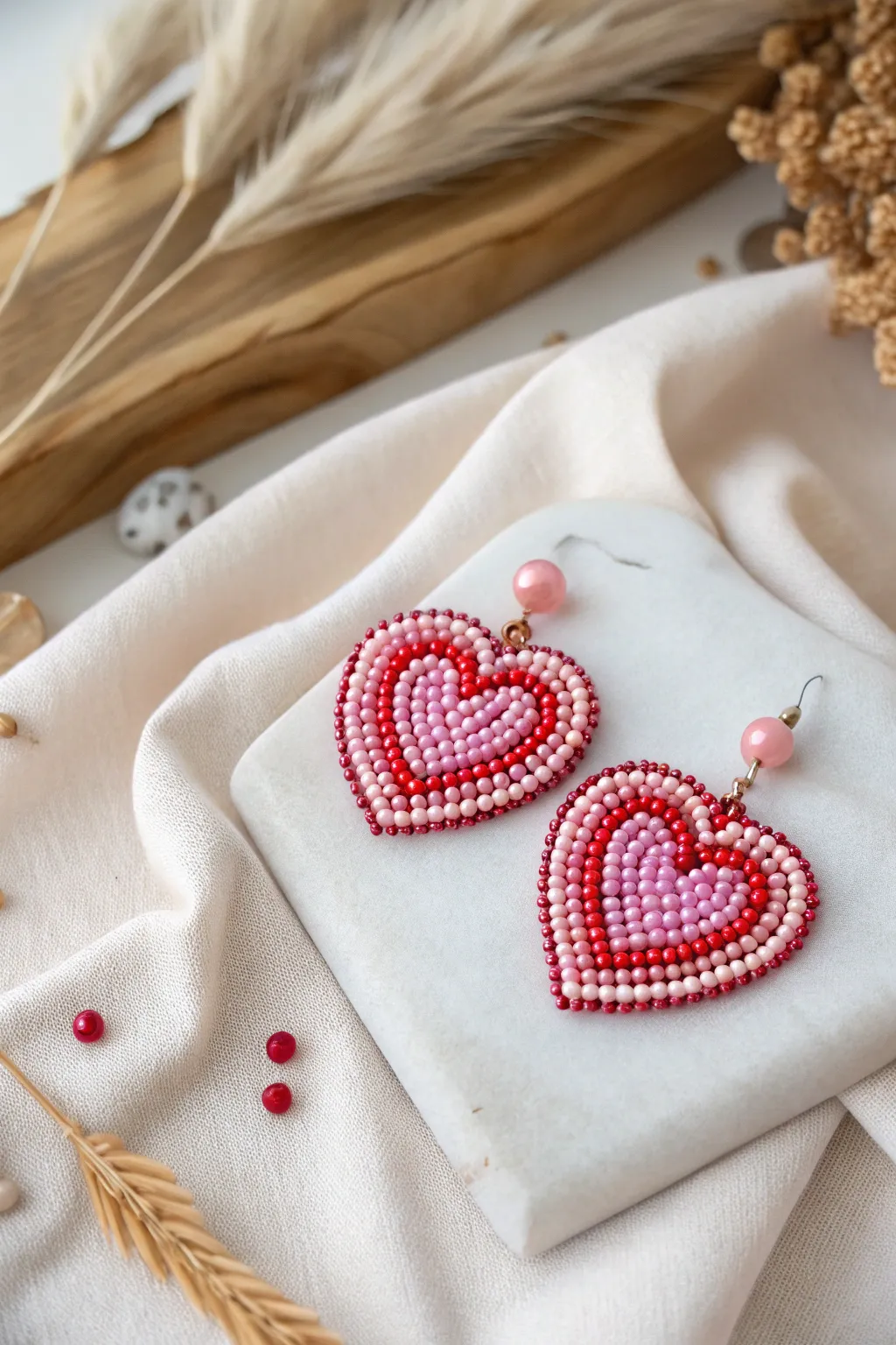 Embrace romance with these charming heart-shaped beaded earrings, perfect for adding a touch of love to your style.