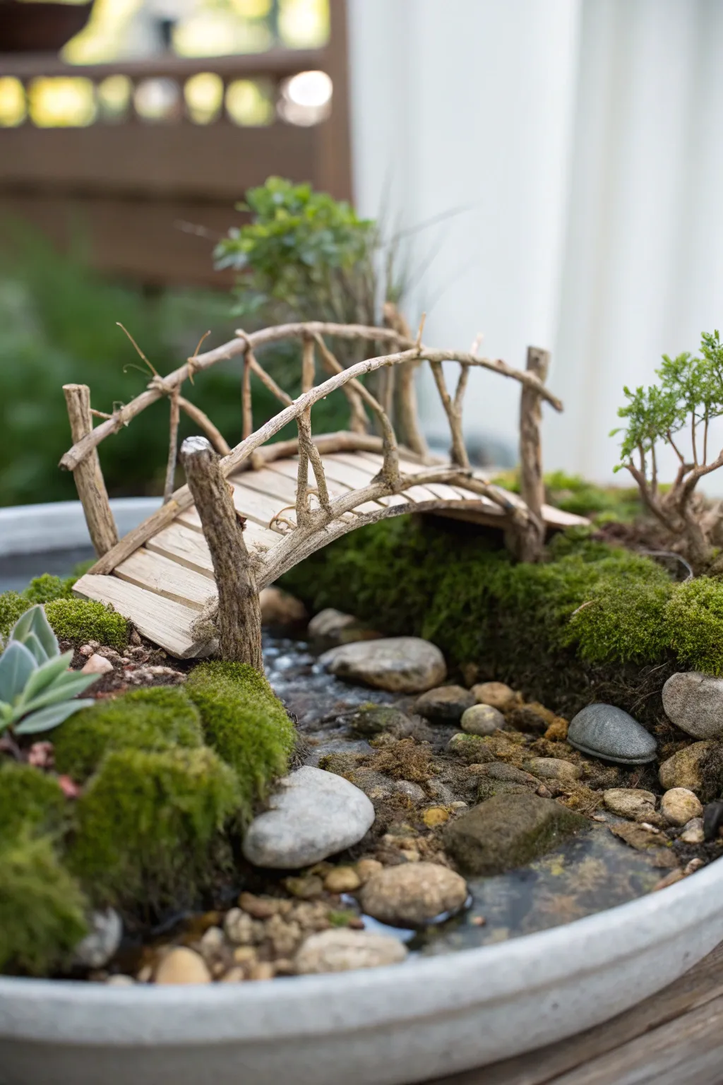 Step into a world of whimsy and wonder with this charming twig bridge in your fairy garden.