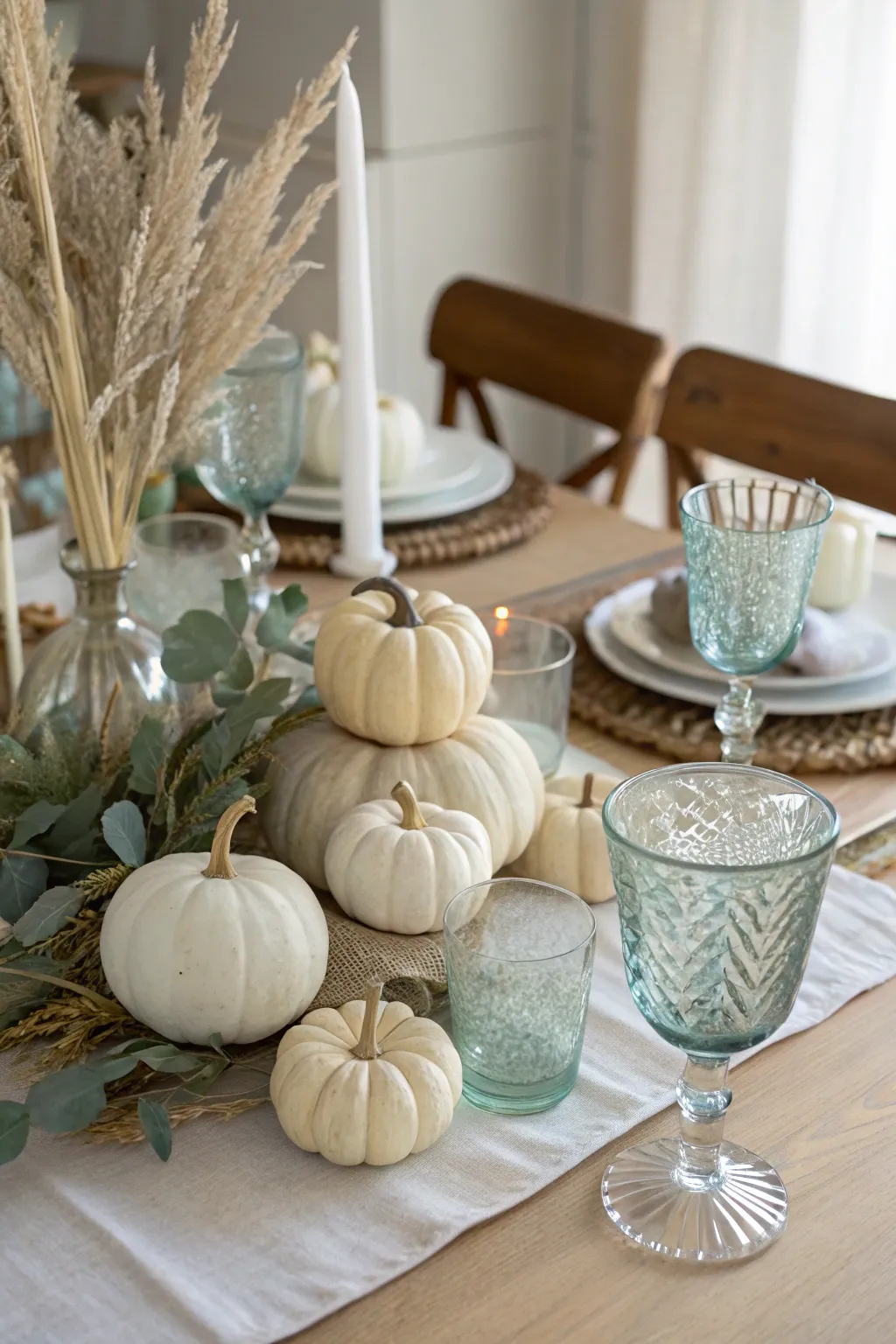 Elevate your table decor with a touch of vintage elegance and boho simplicity. 🍂✨ #PumpkinCenterpiece #VintageElegance