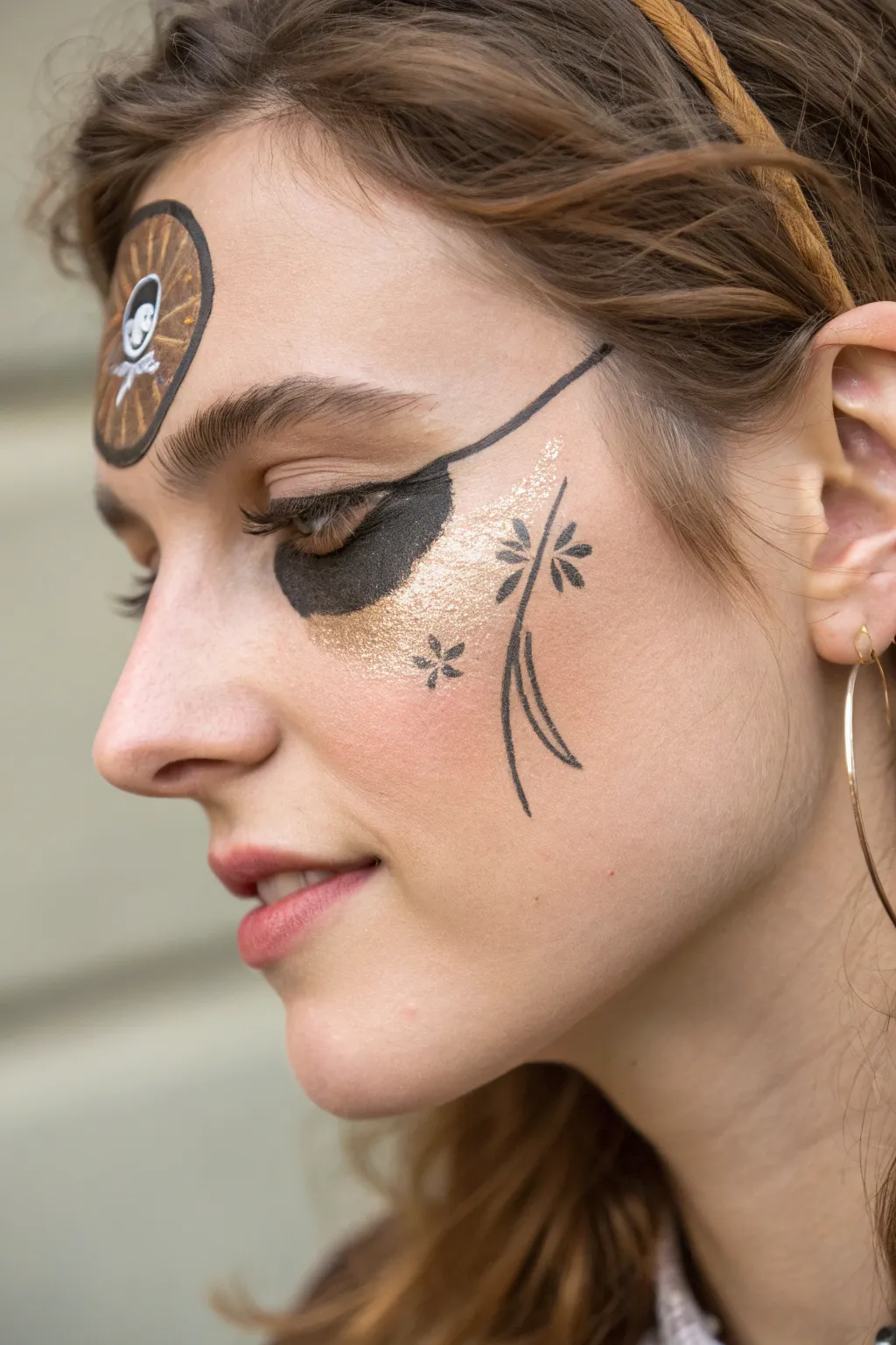 Embrace your adventurous spirit with this charming pirate face paint, perfect for a touch of whimsy at your next themed party.
