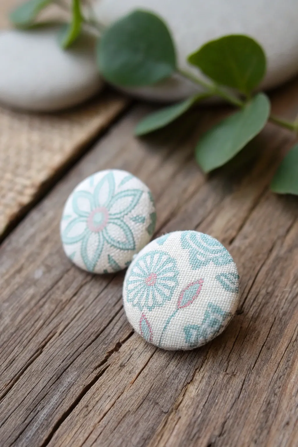 Upcycle your style with these charming fabric button earrings, where simplicity meets elegance.