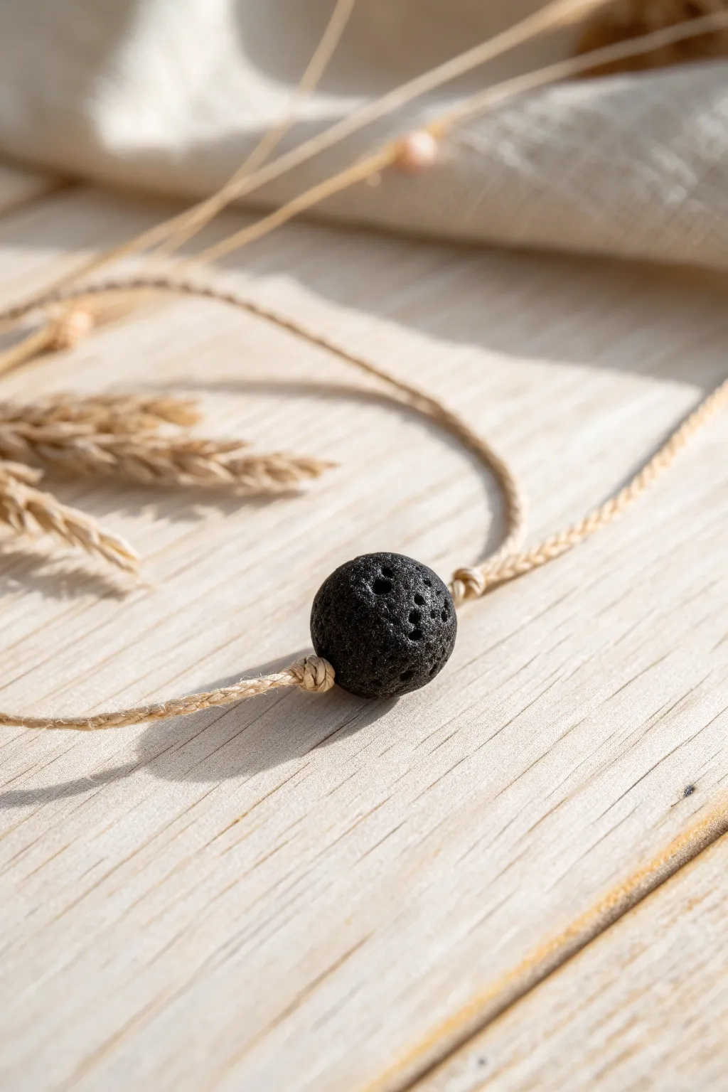 Embrace simplicity with a single lava bead bracelet—where minimalism meets natural elegance.