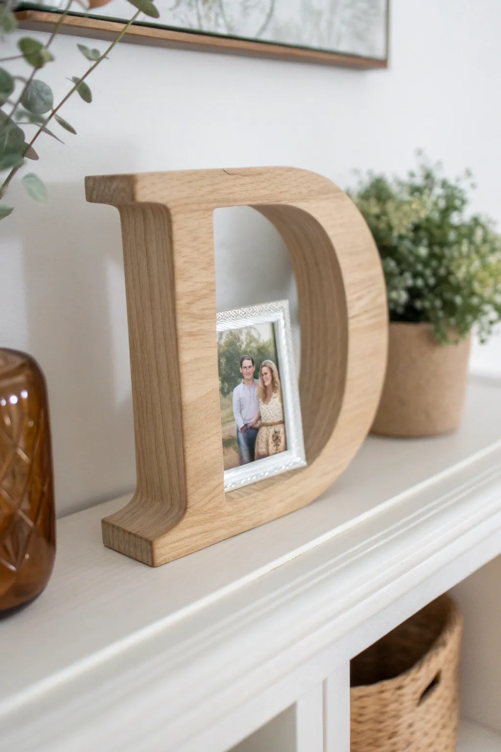 Craft a beautiful, dual-purpose 'D' that frames your cherished memories with style!