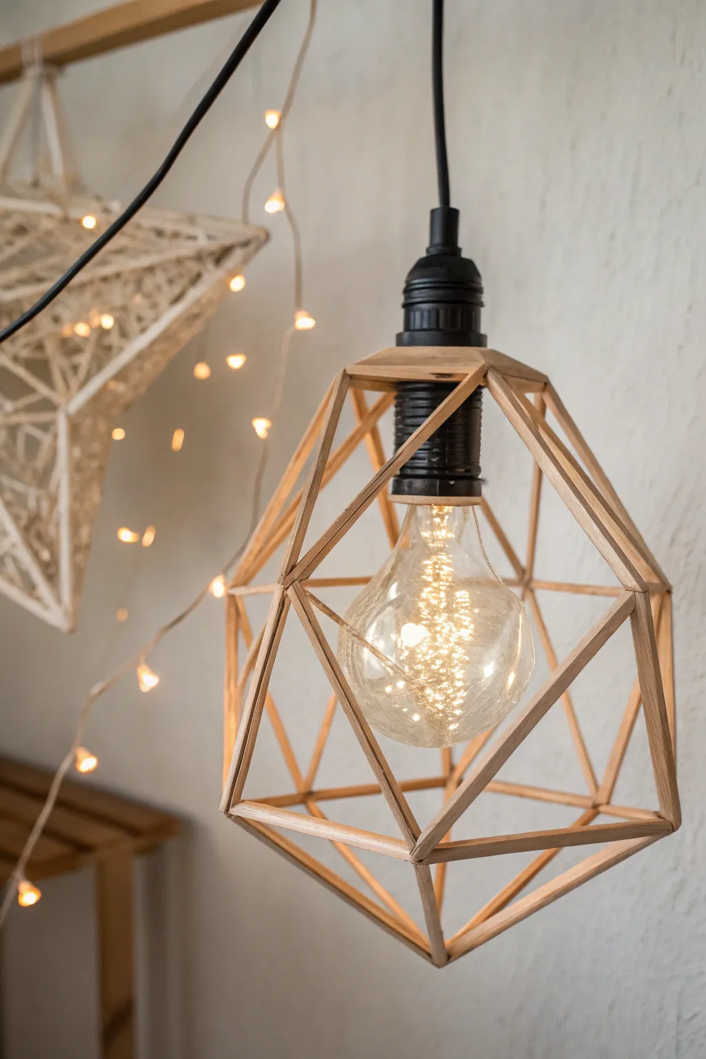 Illuminate your space with minimalist geometric art: crafted light bulbs that blend simplicity with elegance.