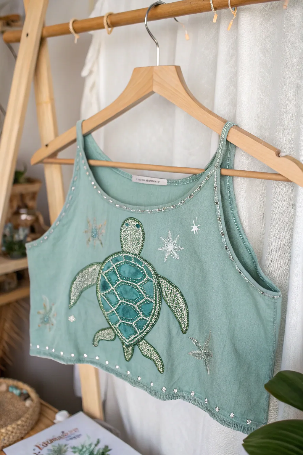 Dive into style: A handcrafted mermaid top with a playful turtle motif adds a splash of whimsy and elegance.