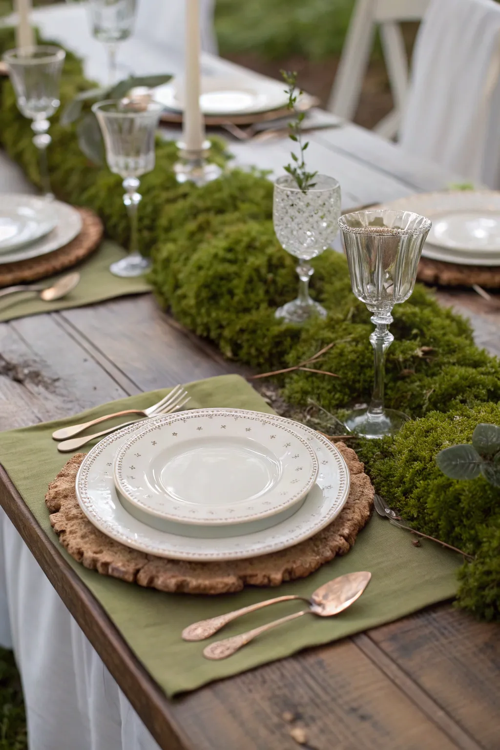 Moss table runners create a fresh and earthy tablescape.