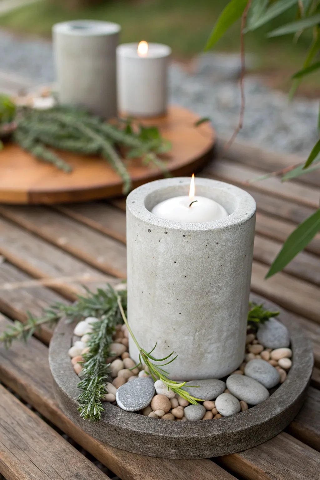 Transform your outdoor gatherings with the timeless elegance of concrete candle centerpieces.