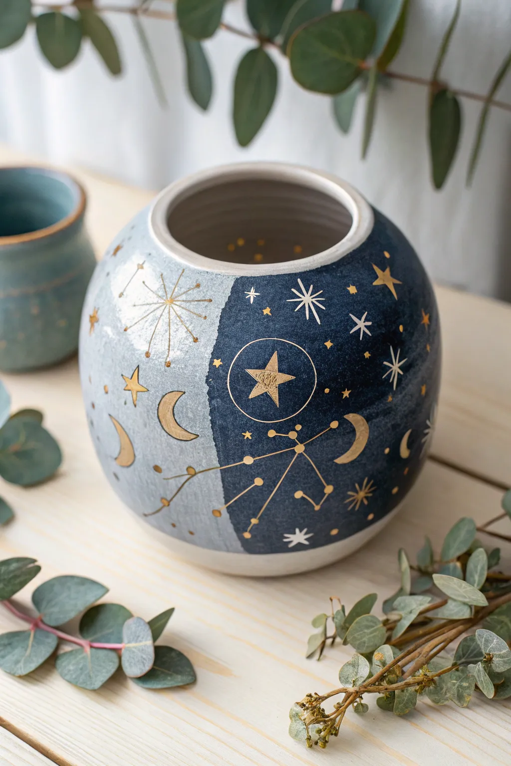 Bring the night sky indoors with this dreamy celestial clay pot, perfect for adding a touch of magic to your space.