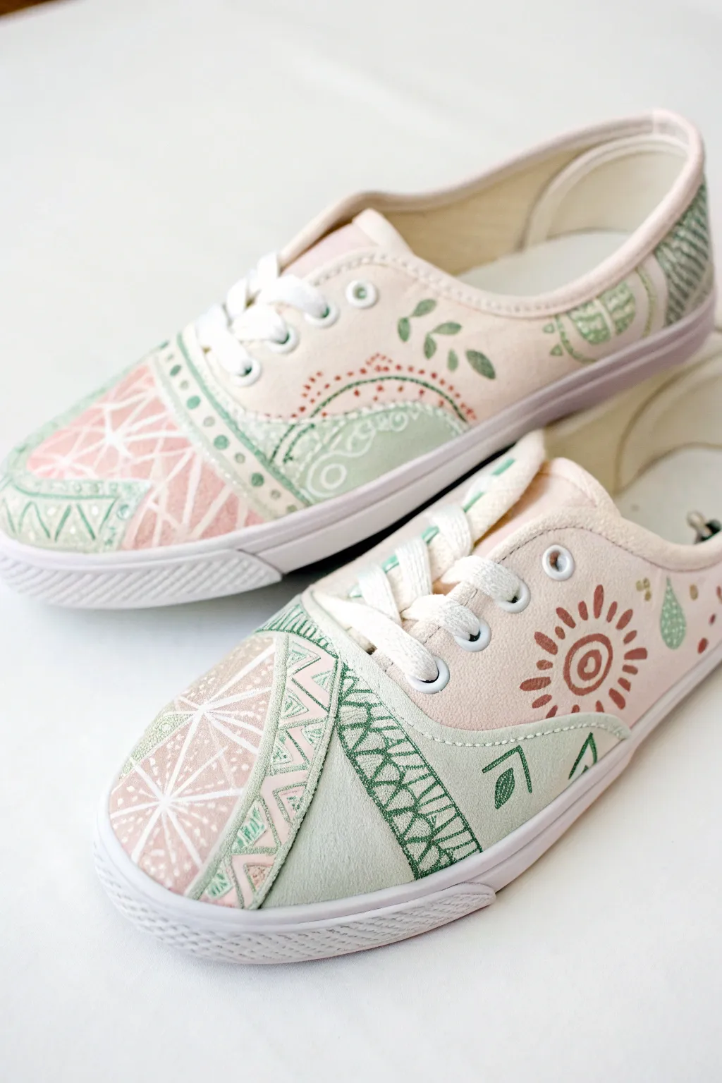 Step into style with these beautifully hand-painted canvas shoes – where minimalism meets boho chic!