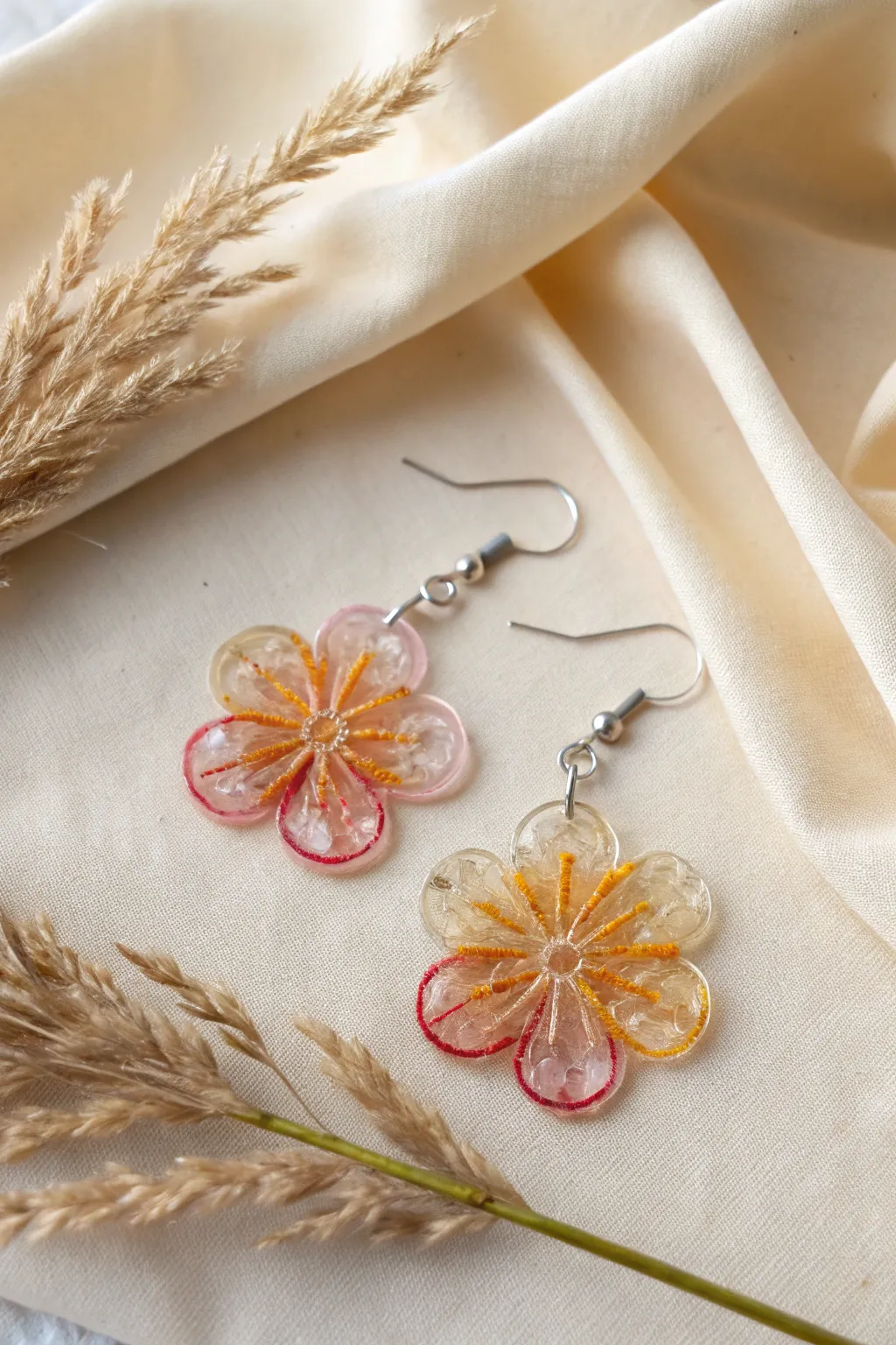 Discover the art of transformation with these stunning recycled plastic flower earrings, where creativity meets sustainability.