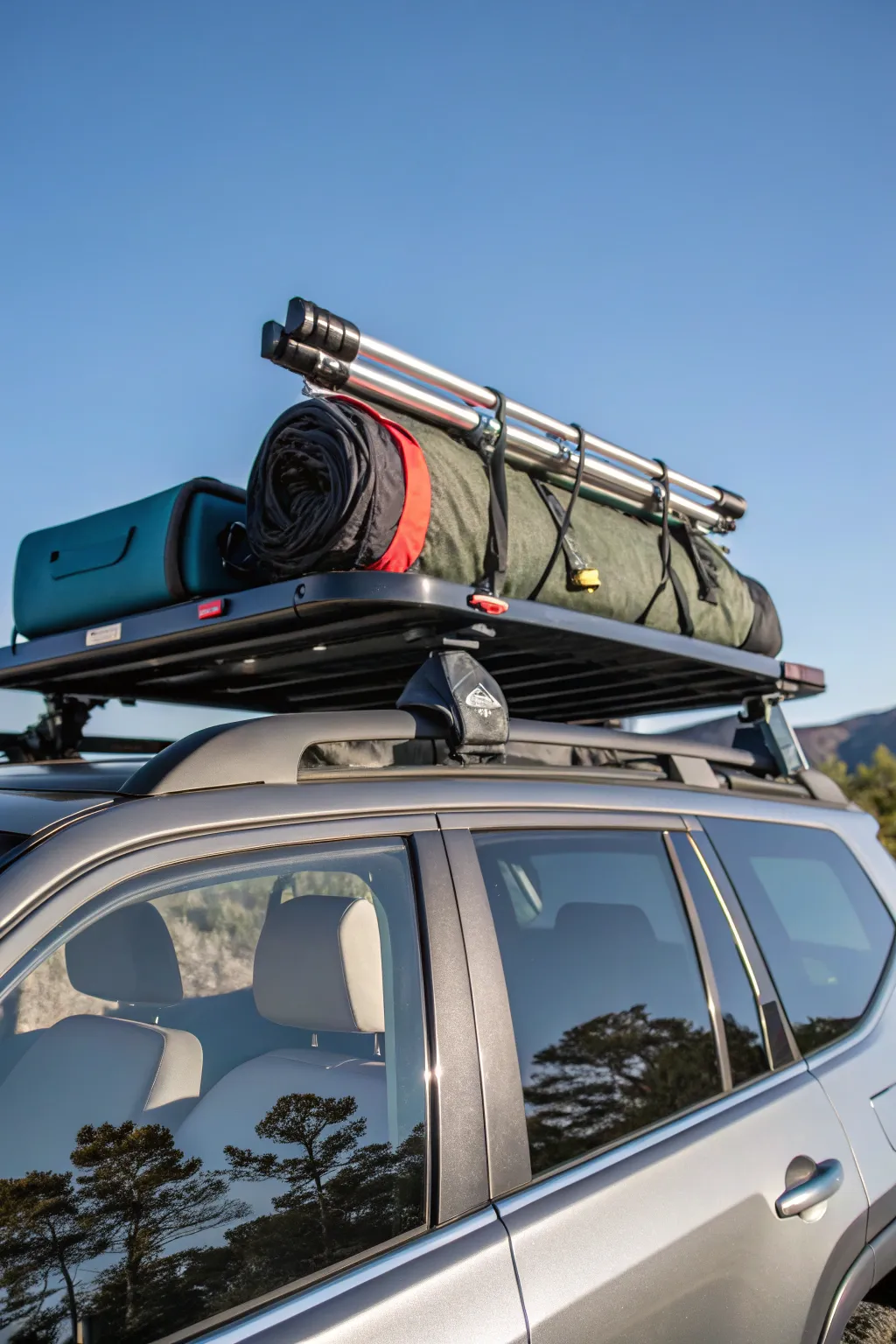 Elevate your adventure: Maximize space with vertical roof rack storage.