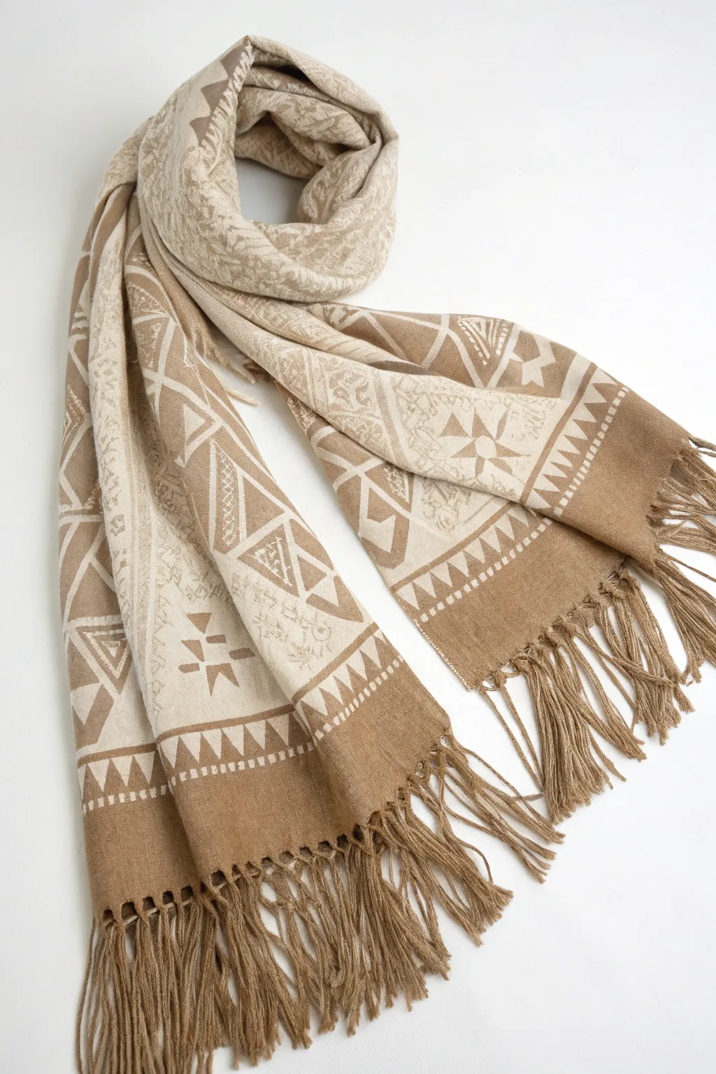 Transform your scarf into a masterpiece with sculpted fringe elegance.