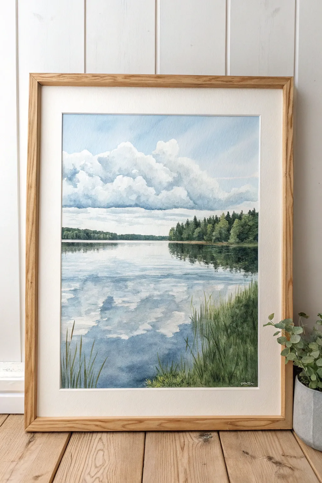 Bring tranquility to your space with this serene lakeside watercolor masterpiece.