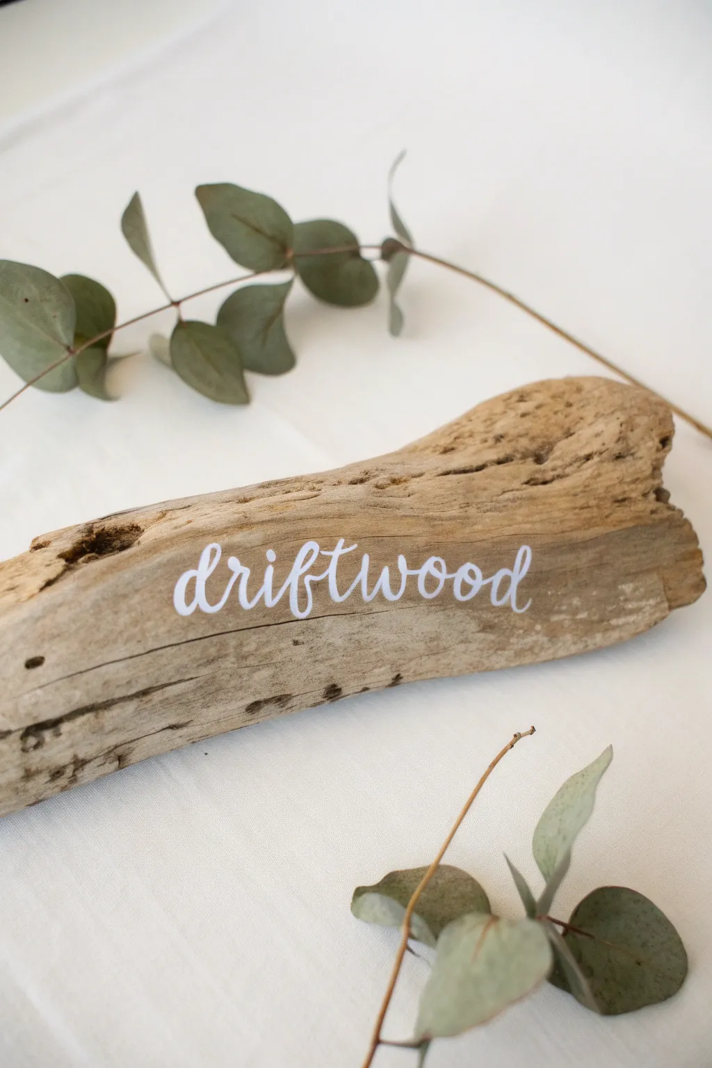 Transform driftwood into a canvas for inspiration with minimalist charm.