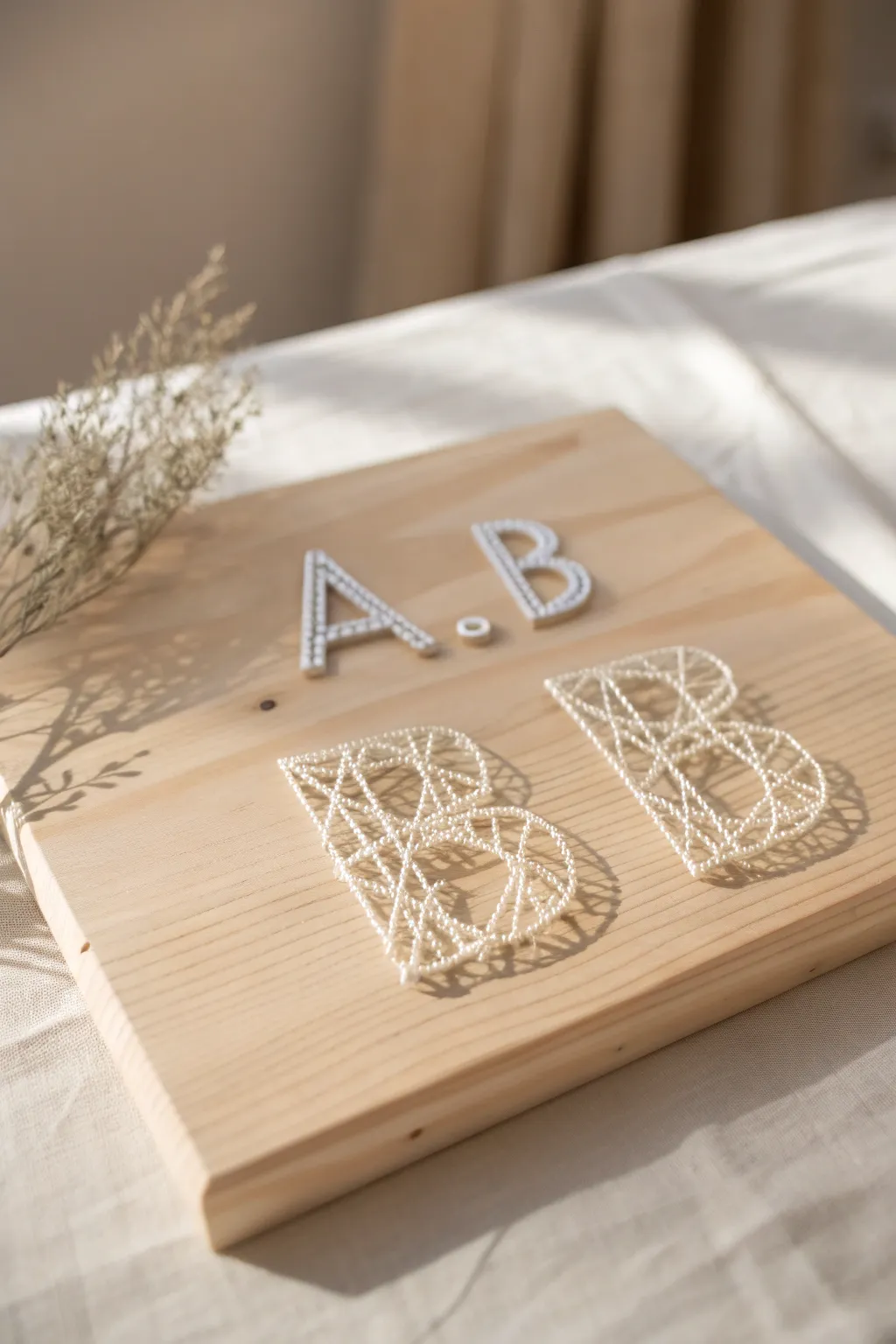 Crafted with love: Elegant monogram string art for a personal touch.