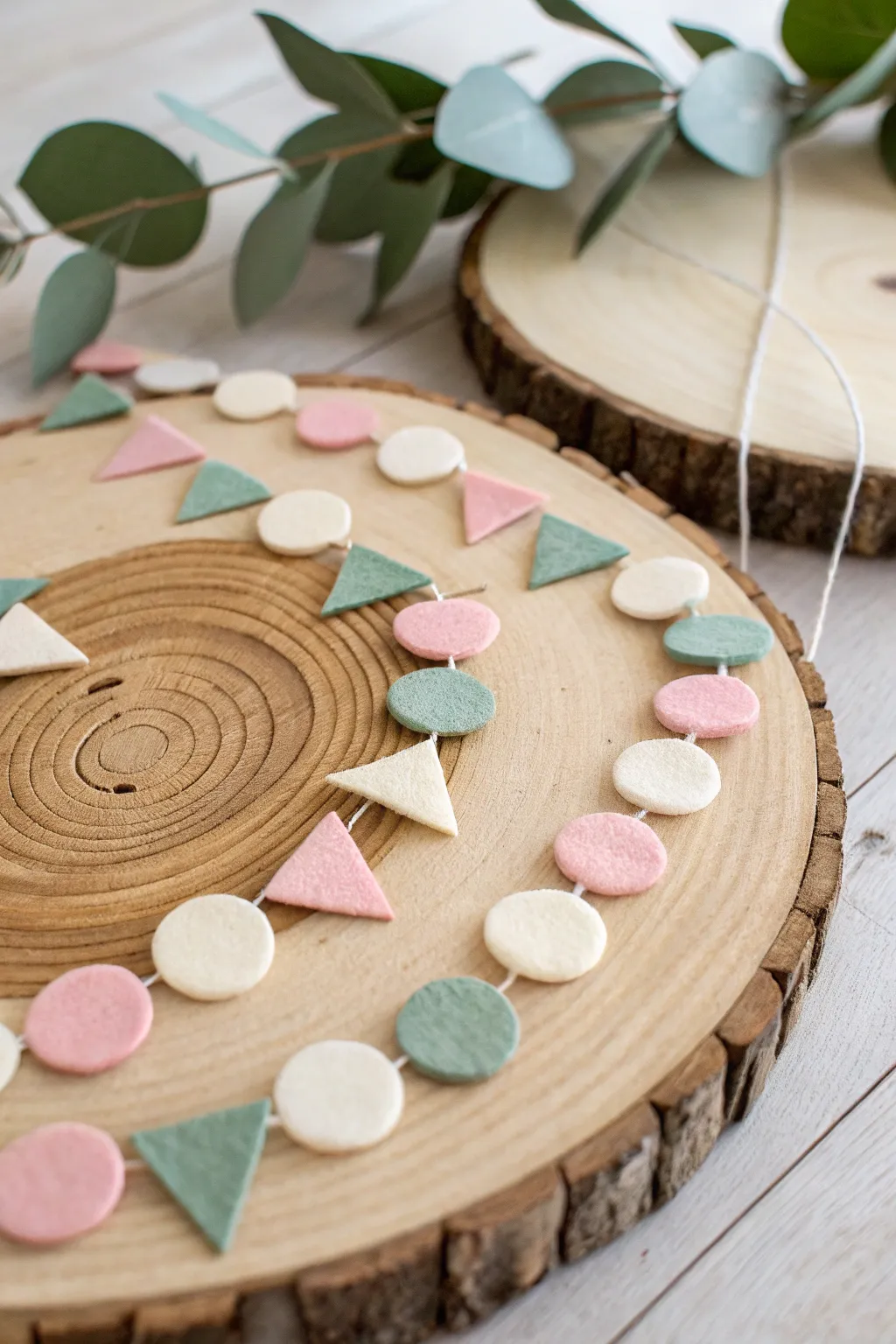 Add a touch of festive elegance to your home with a handcrafted felt garland, perfect for any celebration 🎉🌿