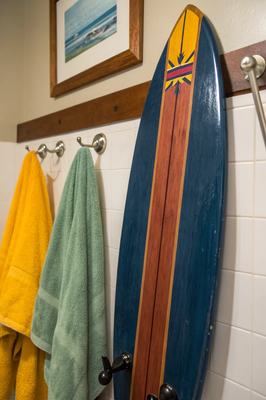 Transform your space with a touch of coastal flair—repurposed surfboard towel rack for the ultimate blend of function and style.