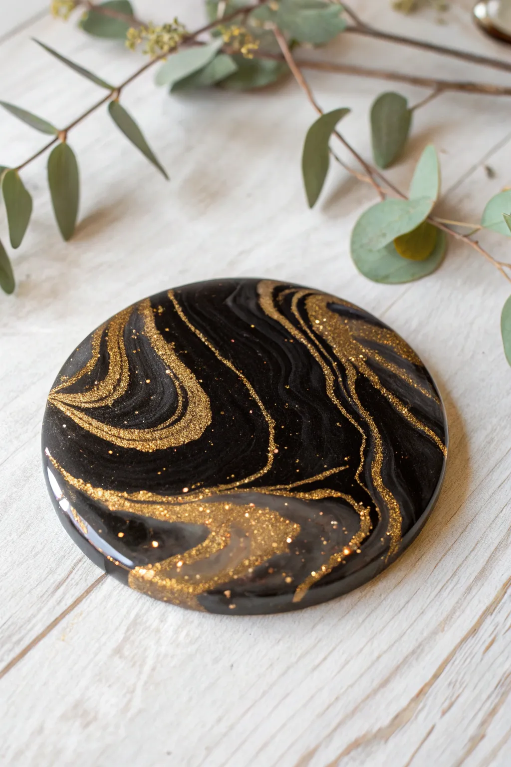 Elevate your space with the timeless elegance of black and gold resin coasters.