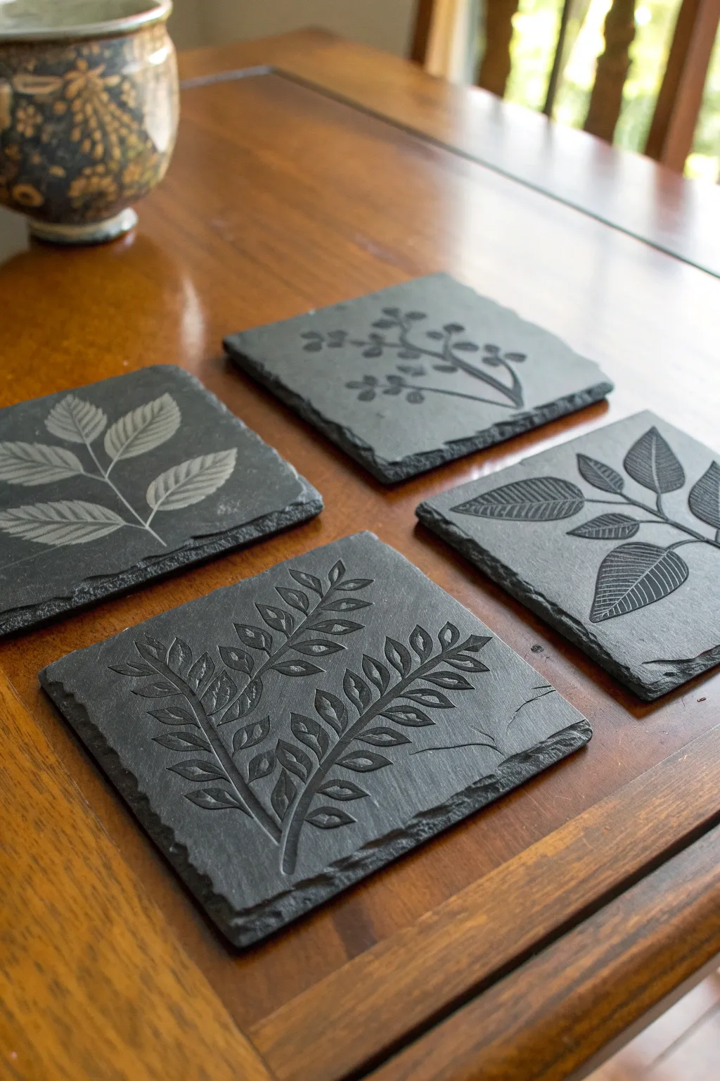 Elevate your table setting with handcrafted slate coasters, where art meets function.