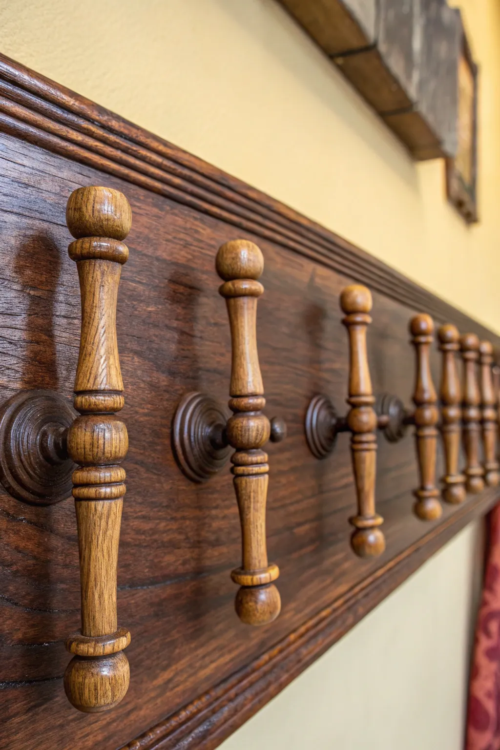 Elevate your entryway with this handcrafted spindle coat hanger, a perfect blend of practicality and rustic charm.